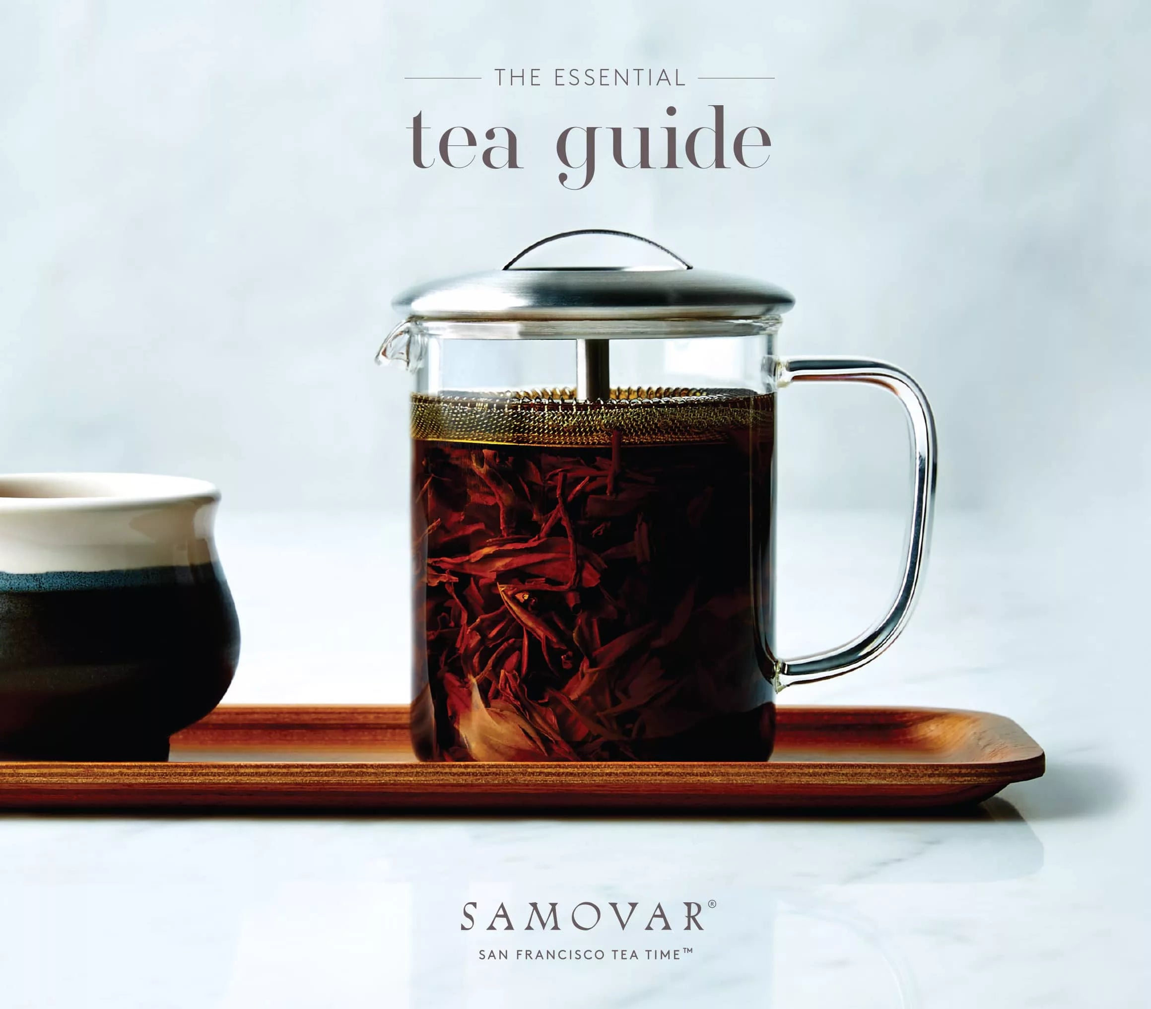 Master the art of tea with this guide, featuring a decorative samovar and step-by-step brewing tips