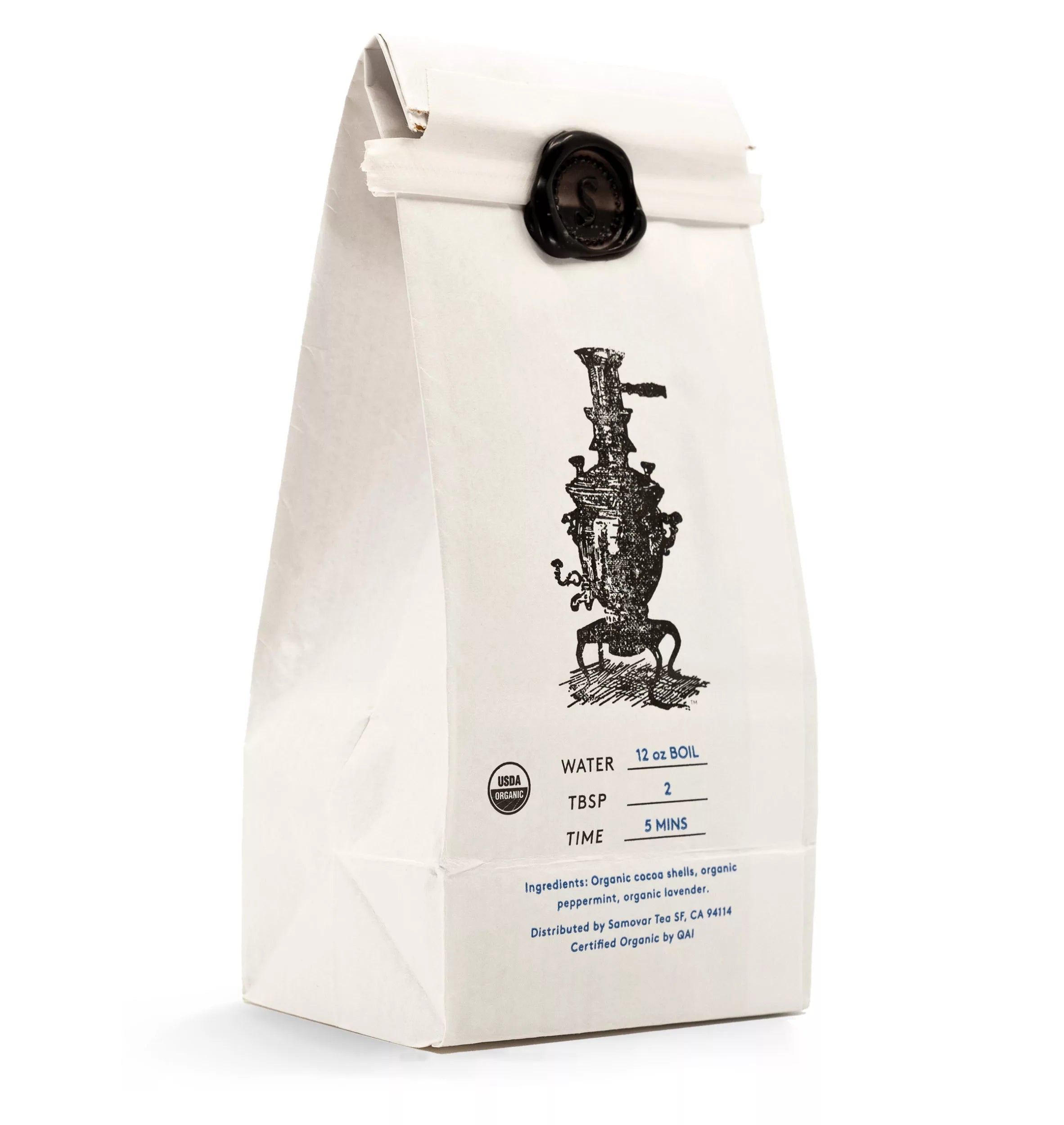 A bag of tea with a black and white design, marked as Cacao Mint herbal tea.