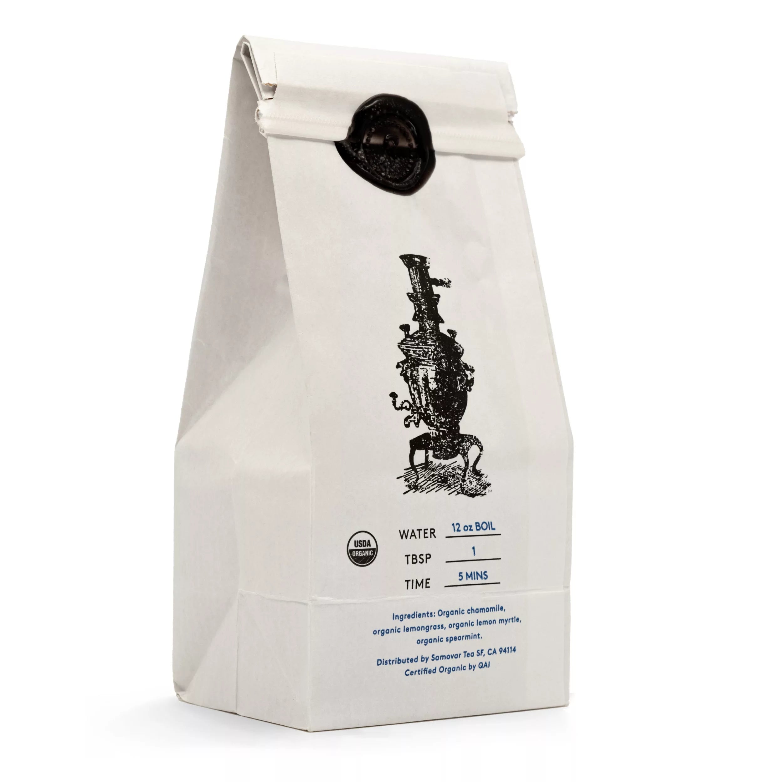 A Chamomile Twist tea bag positioned on a white surface, illustrating its attractive packaging.